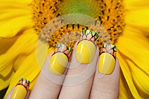 Sunflower nail design.