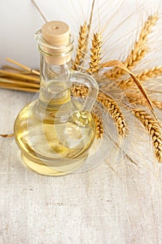 Sunflower oil and ears of wheat