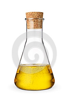 Sunflower oil in glass bottle with cork isolated on white