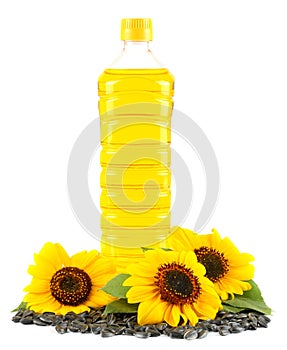 Sunflower oil in plastic bottle, seeds and flower isolated on white background