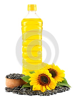 Sunflower oil in plastic bottle, seeds and flower isolated on white background