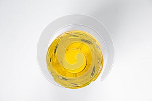 Sunflower oil in a plastic bottle on a white background close-up