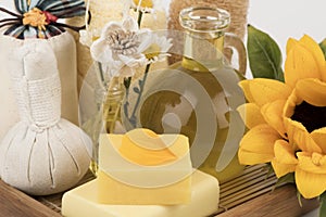 Sunflower oil and soap on a white background.