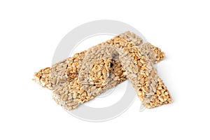 Sunflower seed kozinaki isolated on white. Sweet bars with seeds and caramel.