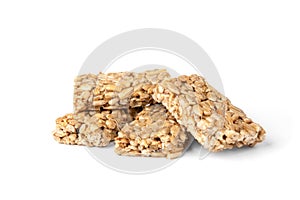 Sunflower seed kozinaki isolated on white. Sweet bars with seeds and caramel.