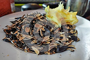 The sunflower seed shells on a plate