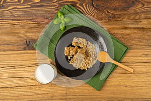 Sunflower Seeds Bar on Black Plate, Energy Snack with Honey, Sun Flower Seed Muesli Dessert