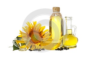Sunflower, seeds and oil isolated on white