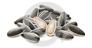 Sunflower seeds pile with two open seeds in the middle isolated on white background