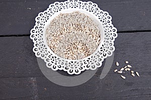 Sunflower seeds in white bowl