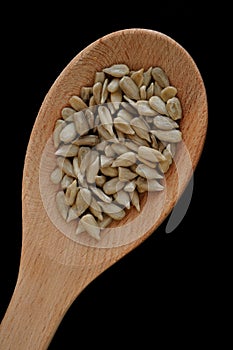 Sunflower Seeds on Wooden Spoon