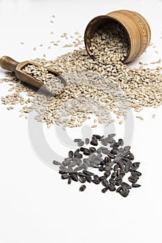 Sunflower seeds, wooden spoon and box. Natural source of iodine and calcium. Health food fitness