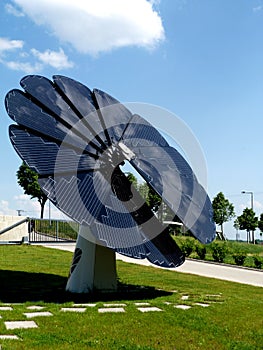 flower shaped solar panel or photovoltaic sun collector panel system. renewable energy concept