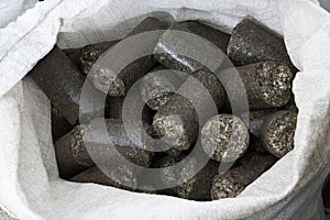 Sunflower shell biomass briquettes in the bag
