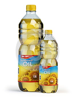 Sunflower or vegetable oil in plastic bottles on white.