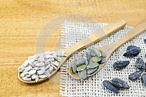 Sunflowers seeds in wooden spoons