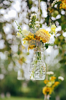 Sunflowers and yellow blum flowers with rustic decoration