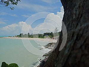 Sungailiat,  Bangka, Indonesia. June 2, 2022. Beautiful Batu Ketak beach in Bangka Island.  Blue Cloud sky. Granite stone. photo