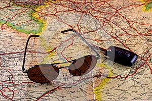 Sunglasses and Car Key on an Old Motoring Route map