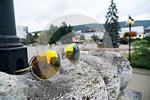 Sunglasses in town during rain. Slovakia