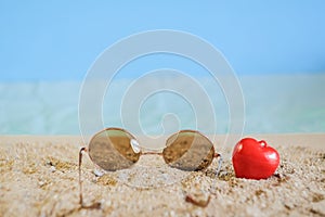 Sunglasses eyeware drop on tropical  beach
