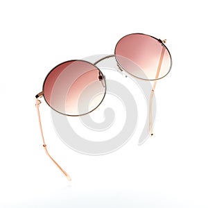 Sunglasses in flying isolated on white and grey background. Retro sunglasses summer woman fashion accessories as design