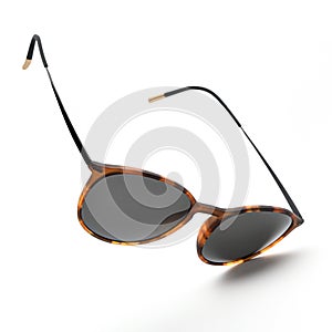 Sunglasses in flying isolated on white and grey background. Sunglasses summer woman fashion accessories as design