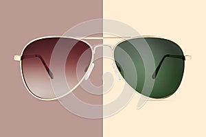 Gafas de sol dorado metálico marco a verde lentes sobre el marrón 