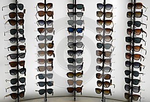 Sunglasses on lighted wall
