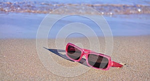 Sunglasses on the sand