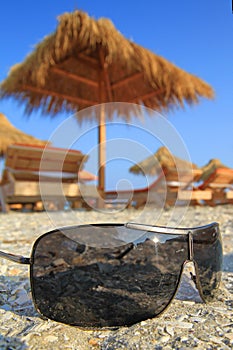 Sunglasses in the sand