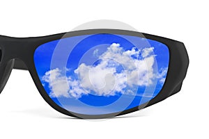 Sunglasses and sky reflection