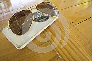 sunglasses top white mobile phone