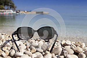 Sunglasses on a tropical beach
