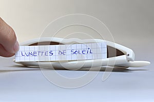 Sunglasses, white background. lunettes de soleil in Franch language