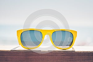 Sunglasses in yellow frame