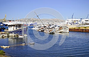 Sunk boats in industrial area of Salamis Greece