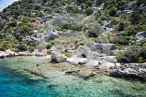 Sunken city of Kekova in bay of Uchagiz view from sea photo