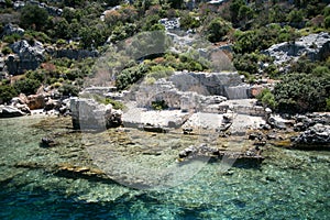 Sunken city of Kekova in bay of Uchagiz view from sea photo