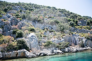 Sunken city of Kekova in bay of Uchagiz view from sea photo