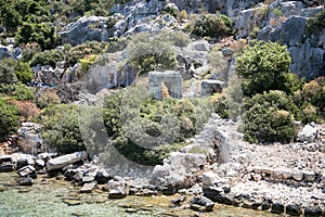 Sunken city of Kekova in bay of Uchagiz view from sea photo