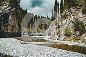 The sunken forest of Lake Kaindy. Lake Kaindy, meaning the `birch tree lake` is a 400-meter-long lake in Kazakhstan that