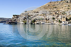 Sunken mosque and houses of the town Halfeti in Sanliurfa, Turkey. The town has remained under the water of a reservoir on the Eup