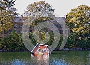 Sunken red house lake MalmÃ¶