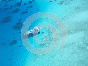 Sunken Ship in Clear Blue Ocean Water