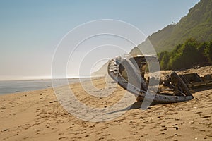 Sunken ship on the shores of Nyang Nyang Beach in Bali, Indonesia. photo