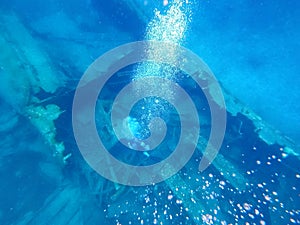 Sunken ship under the sea. Beautifiul underwater colorful coral reef at Caribbean Sea at Honeymoon Beach on St. Thomas