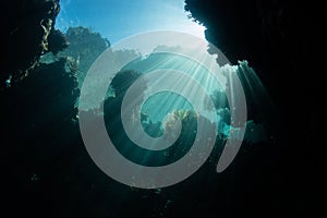 Sunlight Descending Into Underwater Cavern