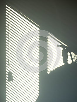 Sunlight,On door and wall,Color white,Shadow on light