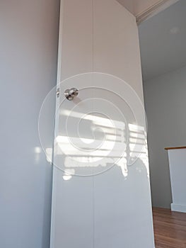 Sunlight,On door and wall,Color white,Shadow on light